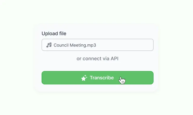 An upload panel holding Council Meeting.mp3, an alternative to connect via API instead, and a Transcribe button under the cursor